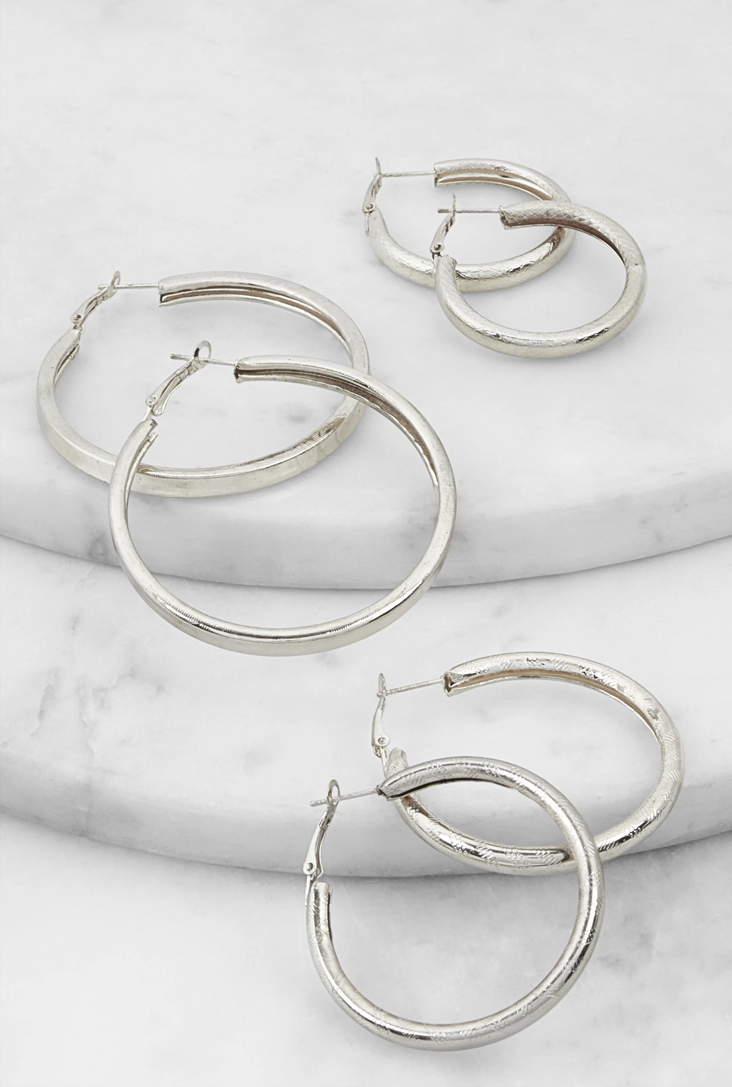 Metallic Textured Hoop Earrings Set of 3 sold by Rainbow