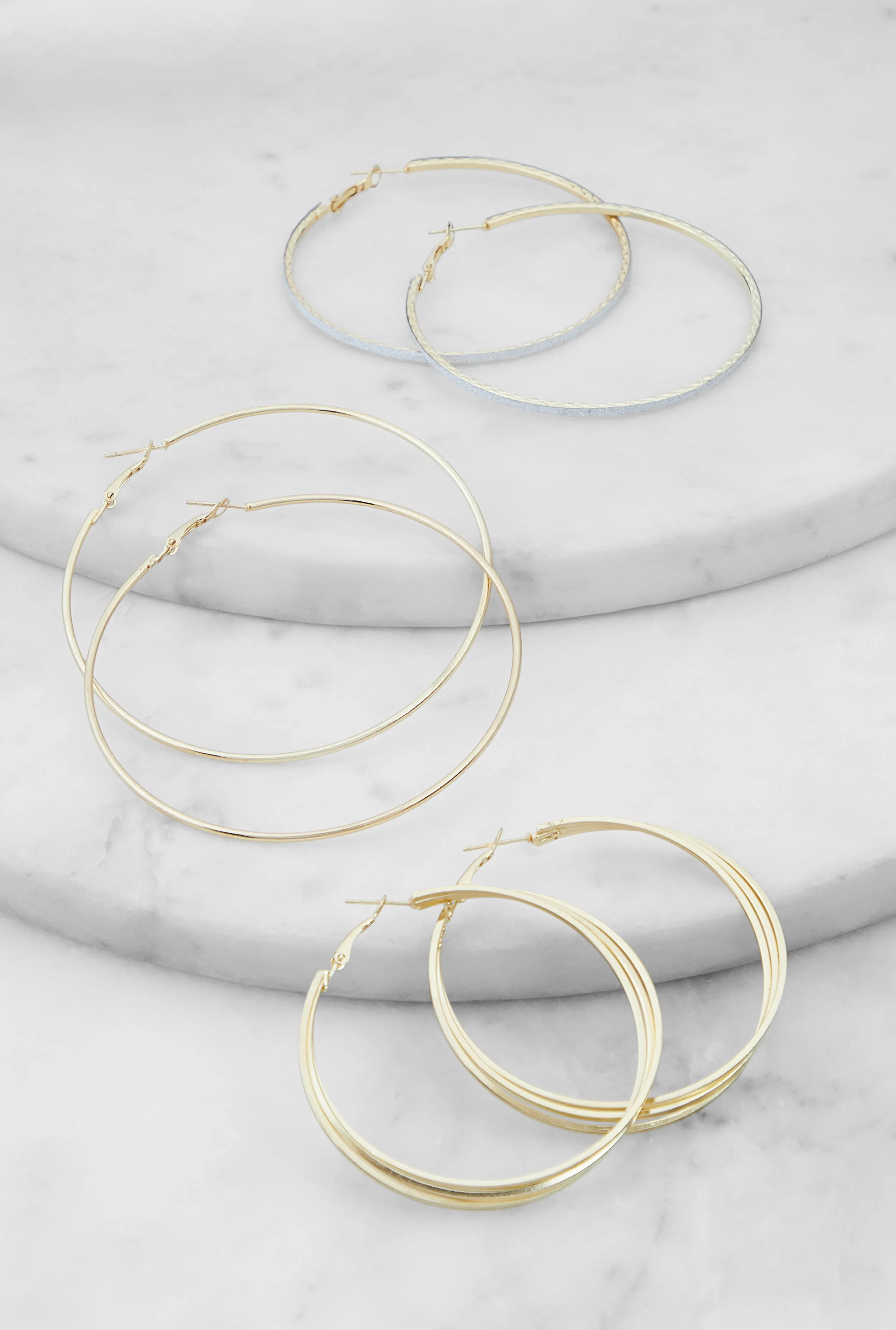 Metallic Hoop Earrings Set of 3 sold by Rainbow