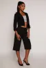 Pinstripe Pleated Bermuda Shorts sold by Rainbow