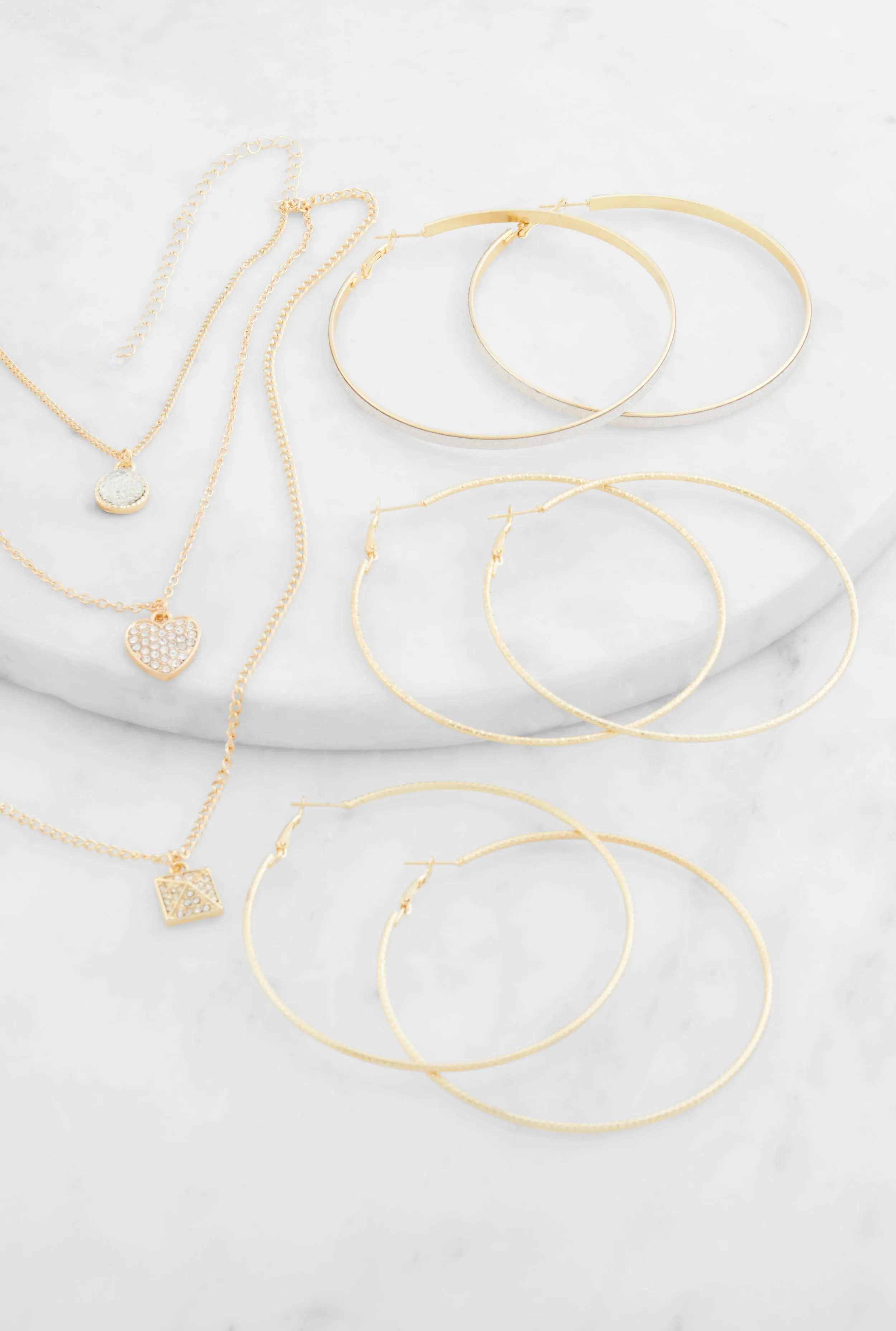 Cubic Zirconia Charm Layered Necklace and Earring Trio sold by Rainbow