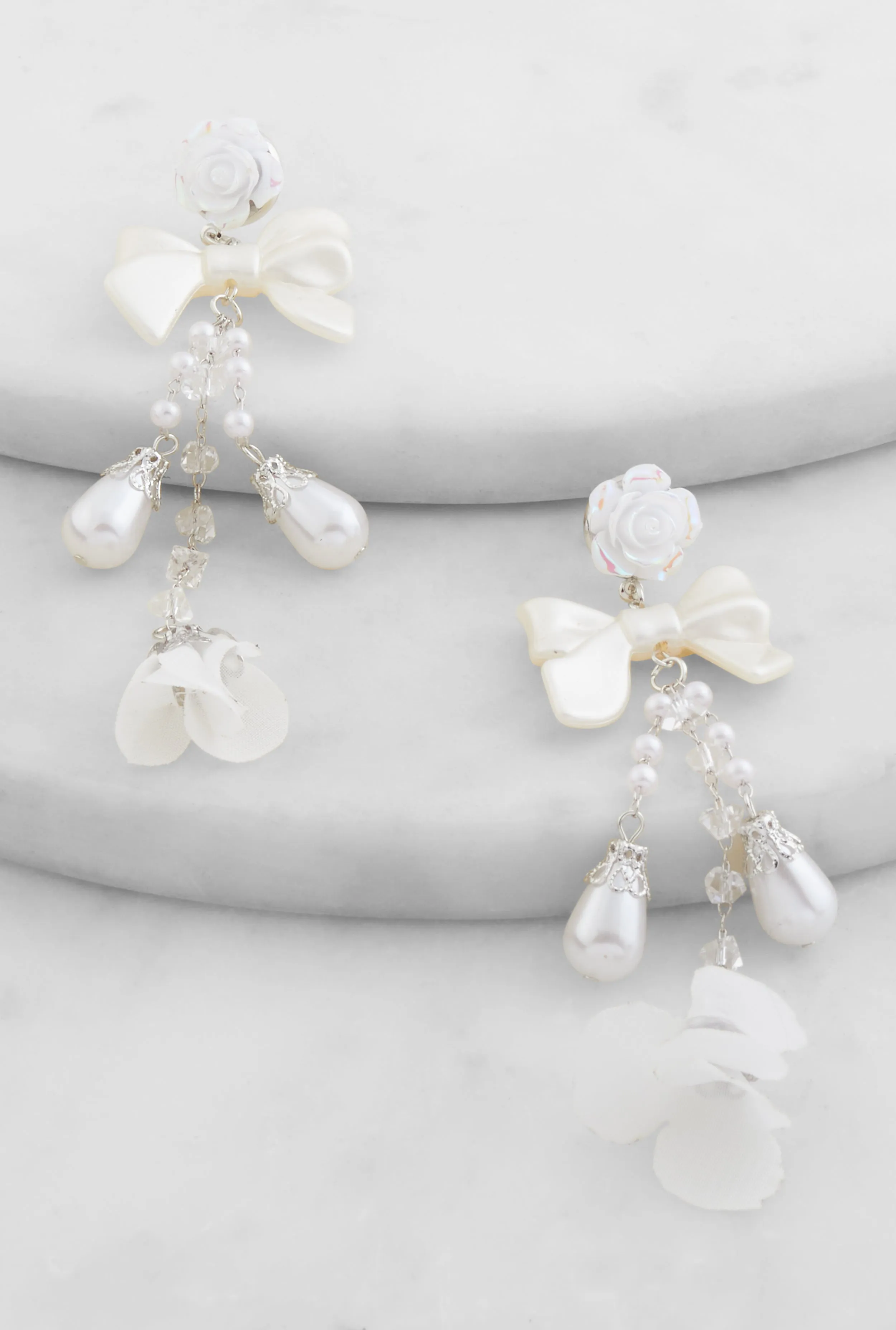 Faux Pearl Bow Detail Drop Earrings sold by Rainbow product image thumbnail 2