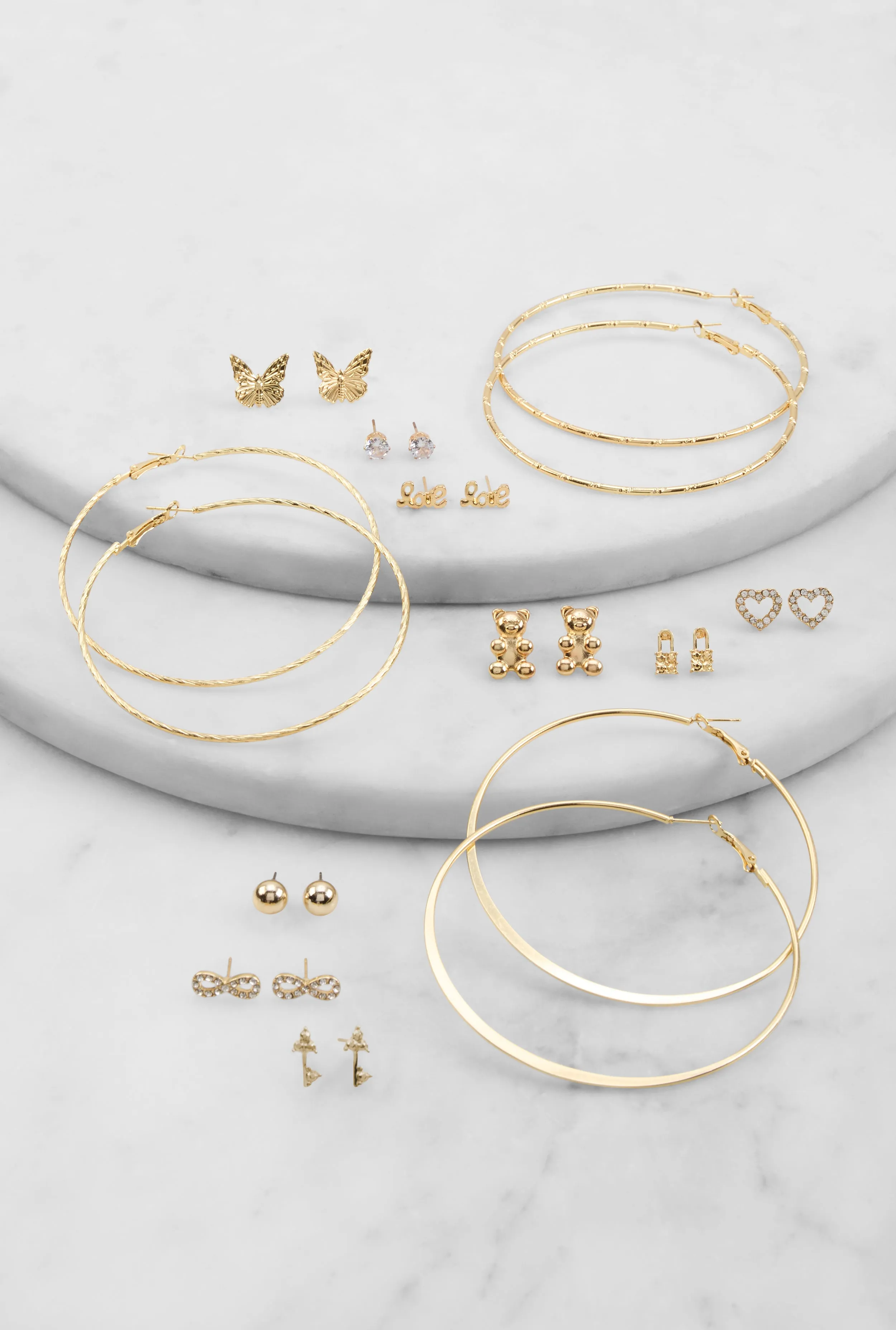 Metallic Assorted Stud and Hoop Earrings Set of 12 sold by Rainbow