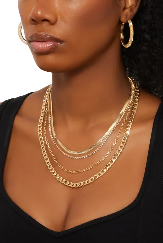 Layered Chain Necklace and Rhinestone Caged Hoop Earrings sold by Rainbow