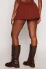 Daisy High Waisted Pleated Mini Skirt sold by Rainbow
