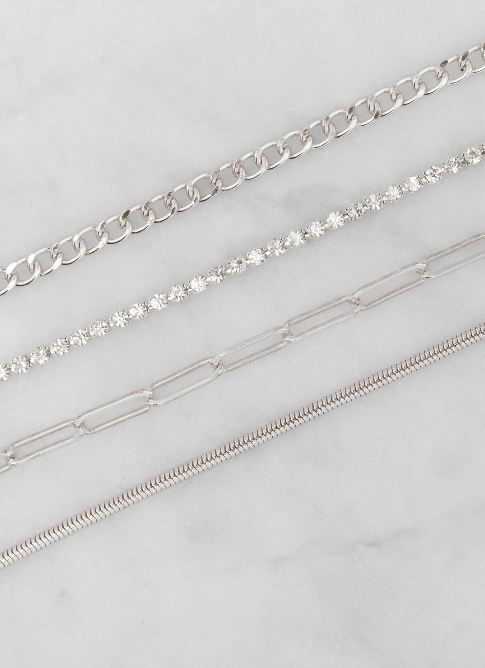 Cubic Zirconia Chain Link Anklets Set of 4 sold by Rainbow product image thumbnail 2