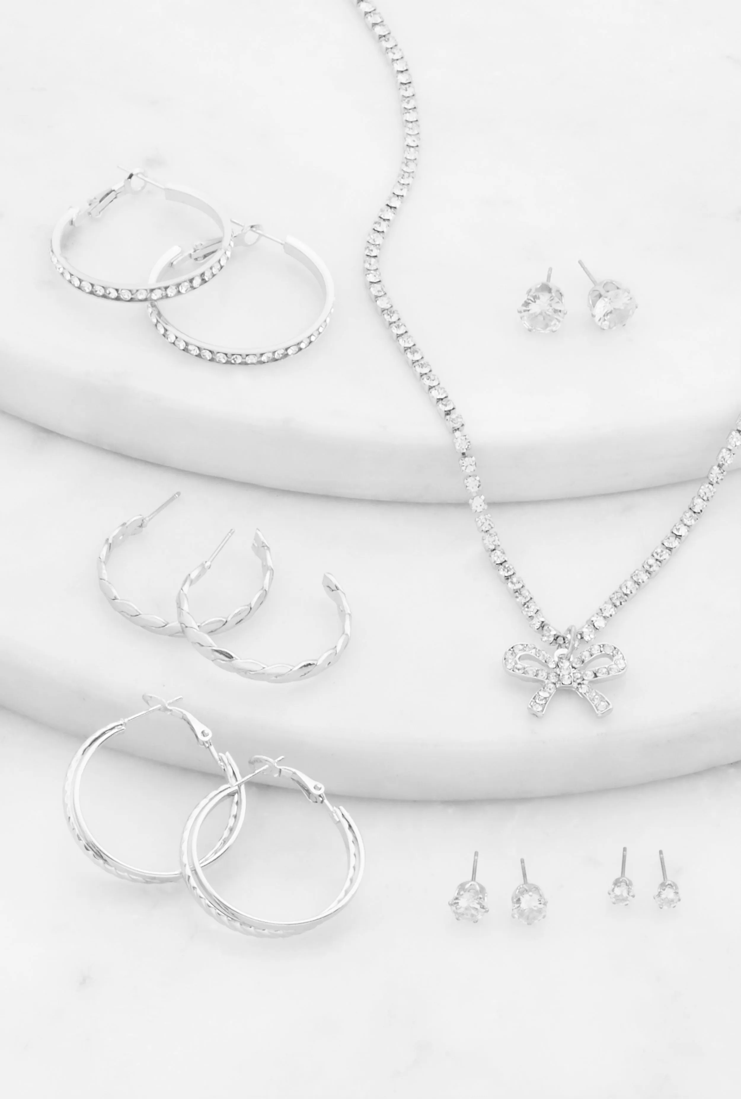 Cubic Zirconia Bow Necklace with Hoop and Stud Earrings sold by Rainbow