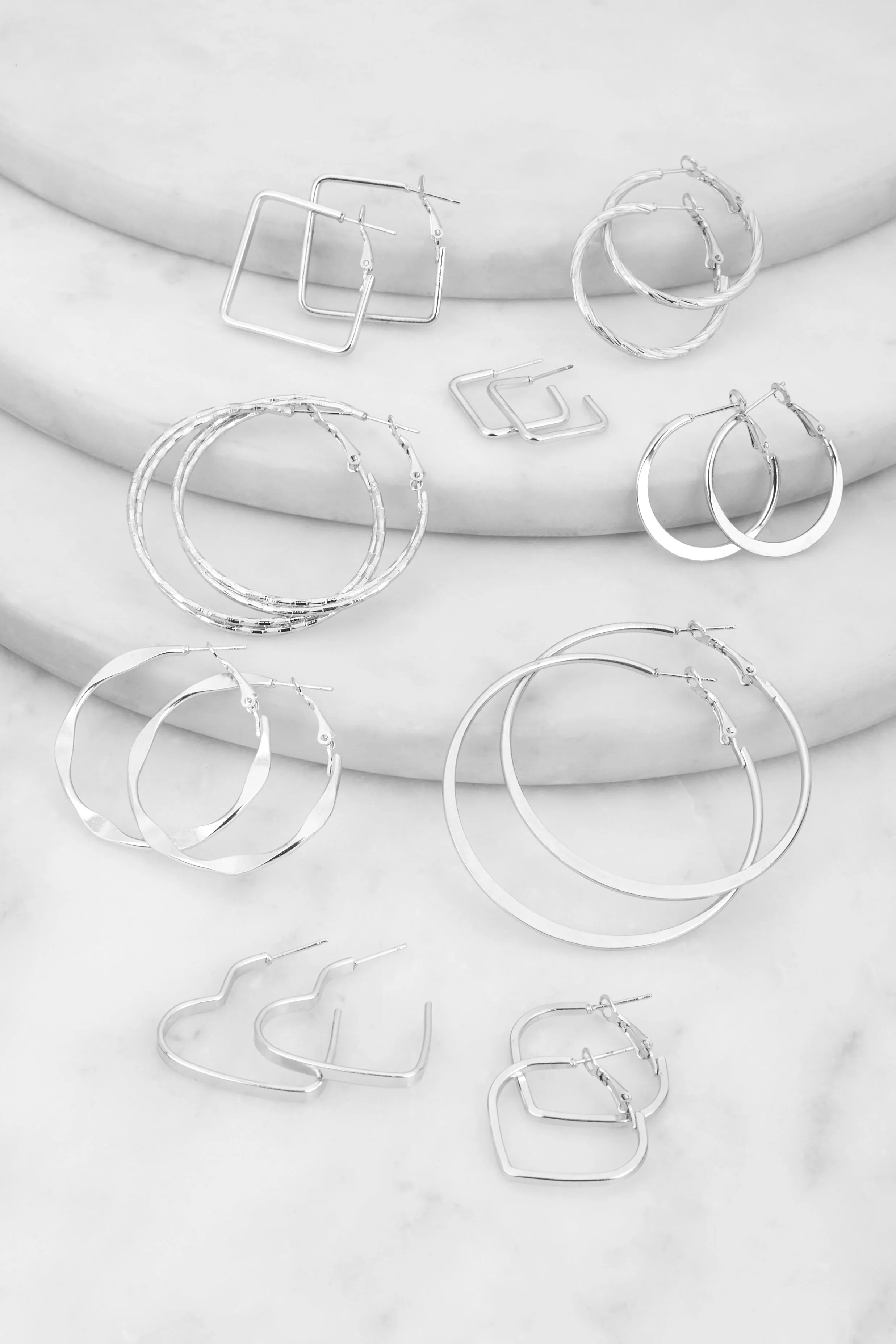 Assorted Metallic Geometric Hoop Earrings sold by Rainbow