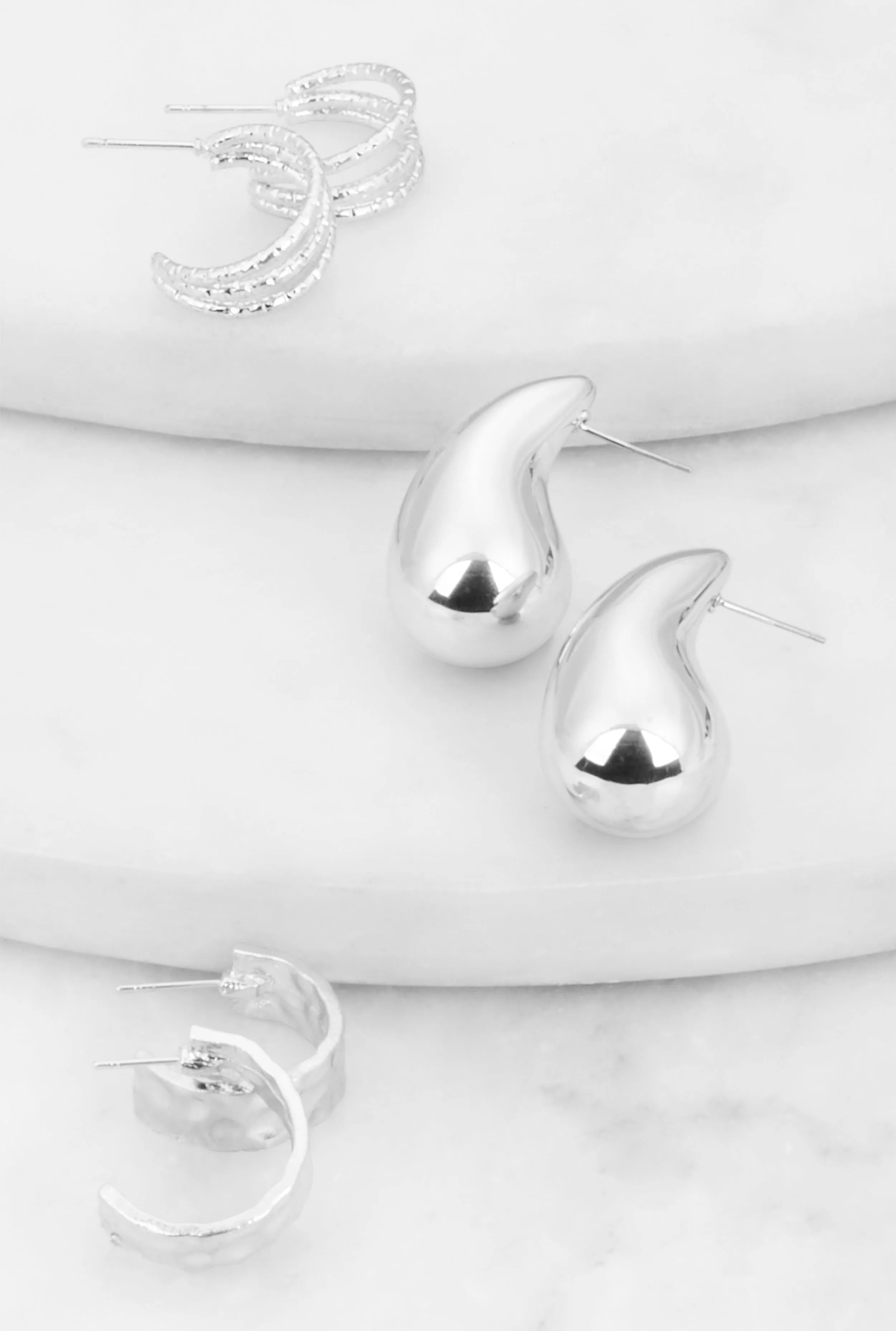 Metallic Earrings Set of 3 sold by Rainbow