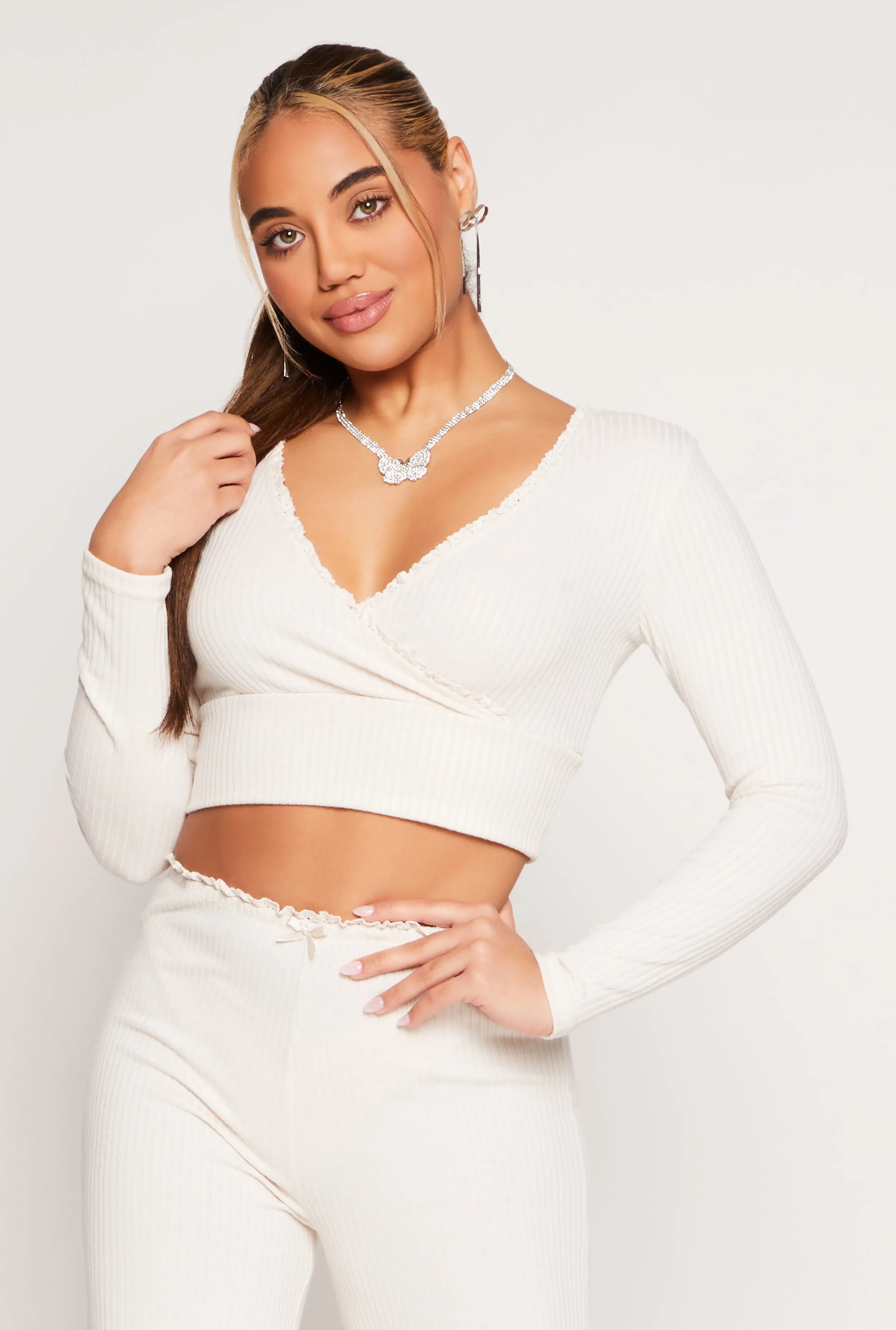 Almost Famous Lace Trim Faux Wrap Crop Top sold by Rainbow