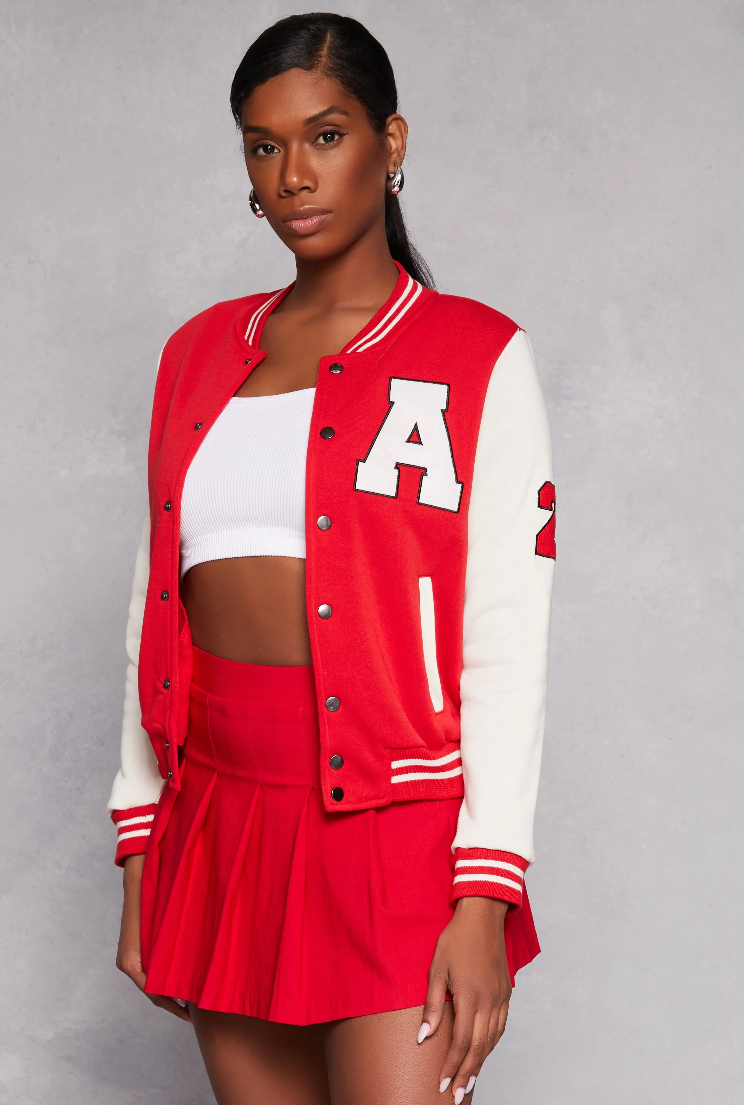 A Initial Patch Fleece Varsity Jacket sold by Rainbow