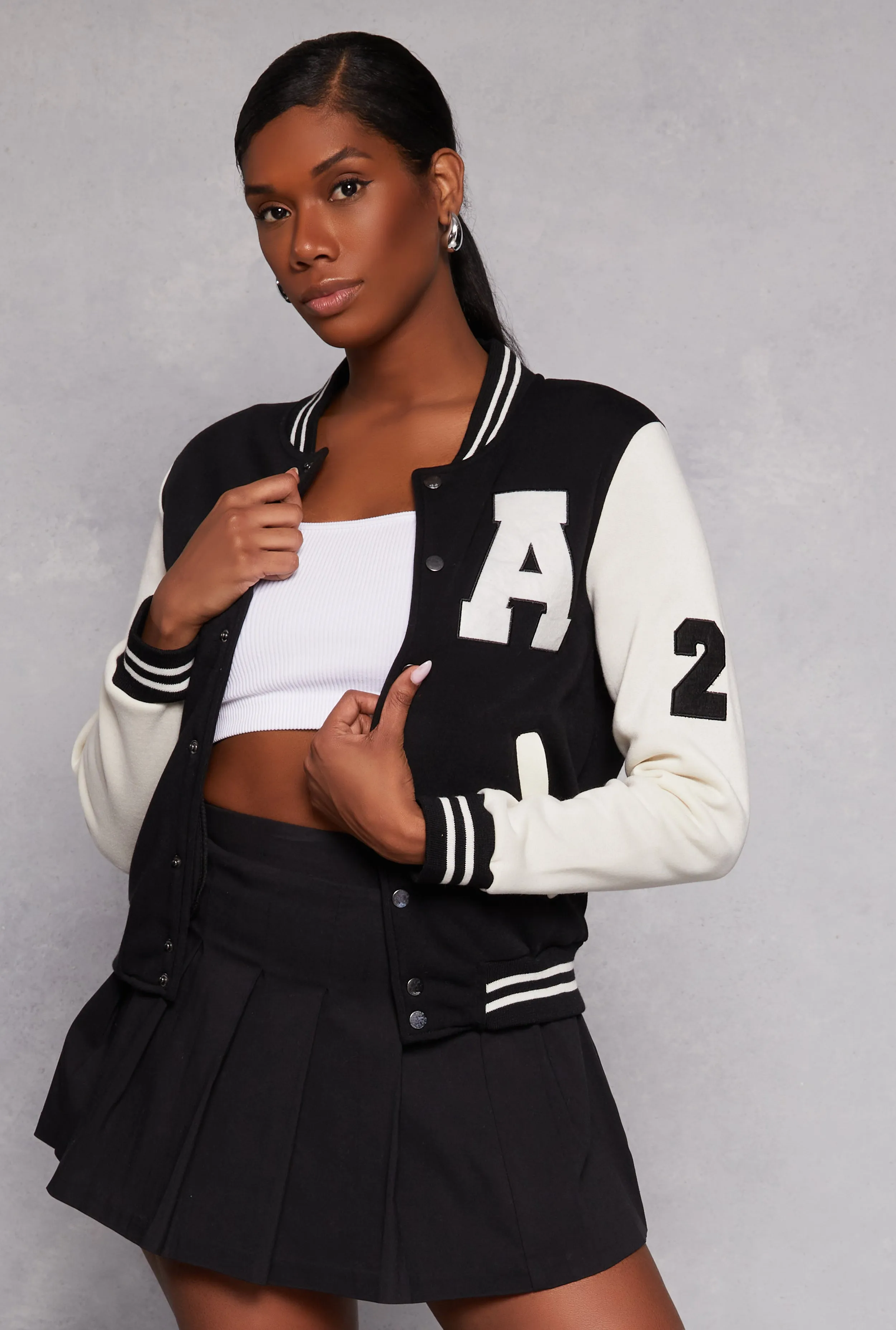 A Initial Patch Fleece Varsity Jacket sold by Rainbow