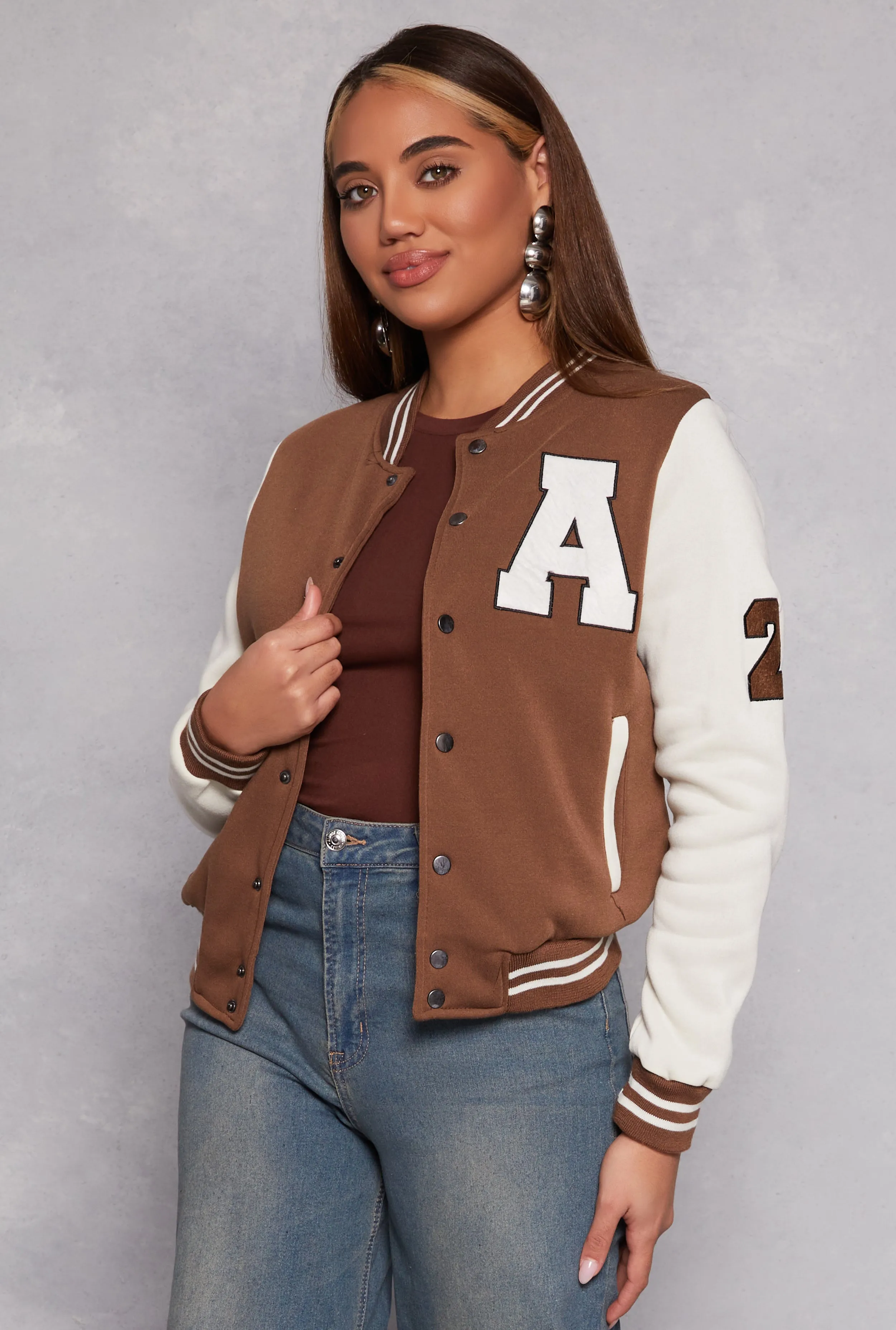 A Initial Patch Fleece Varsity Jacket sold by Rainbow