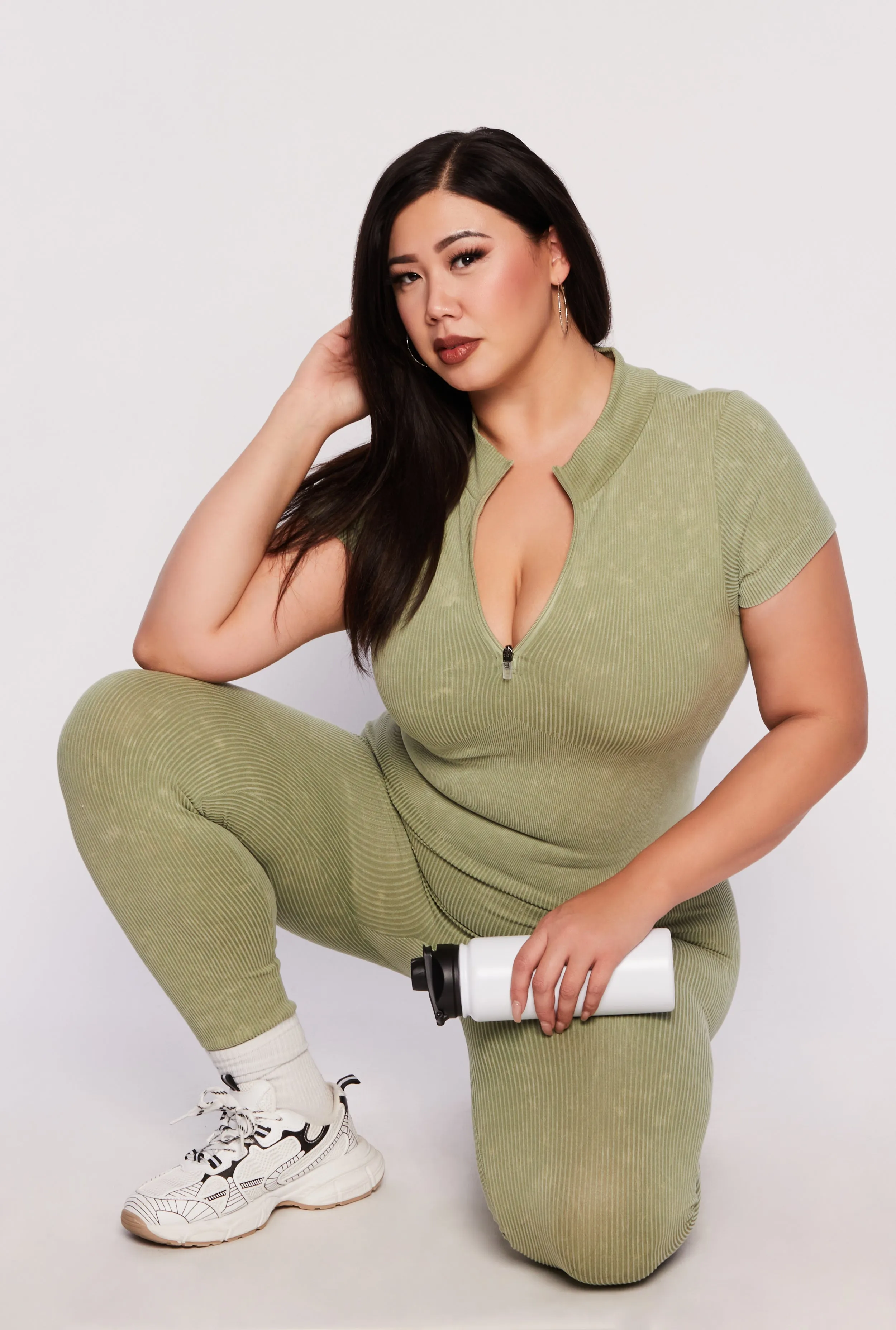 Plus Size Ribbed Knit Zip Neck Catsuit sold by Rainbow