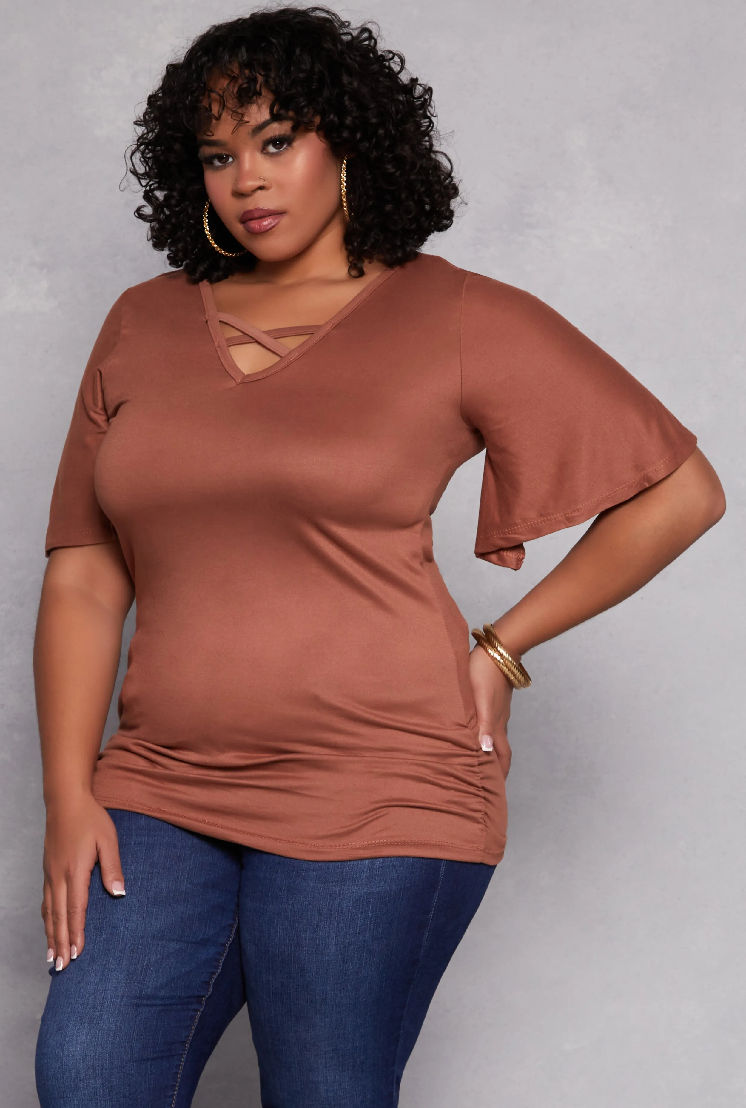Plus Size Criss Cross V Neck Flutter Sleeve Top sold by Rainbow