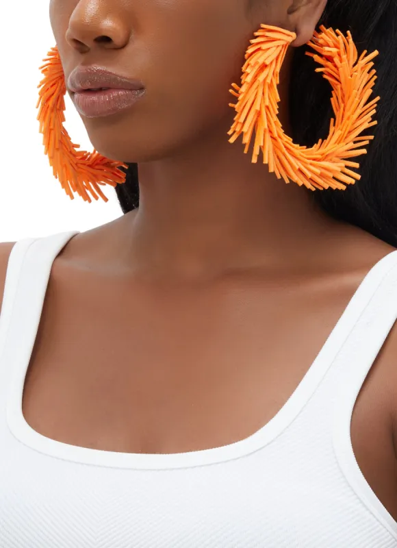 Faux Suede Fringe Hoop Earrings sold by Rainbow