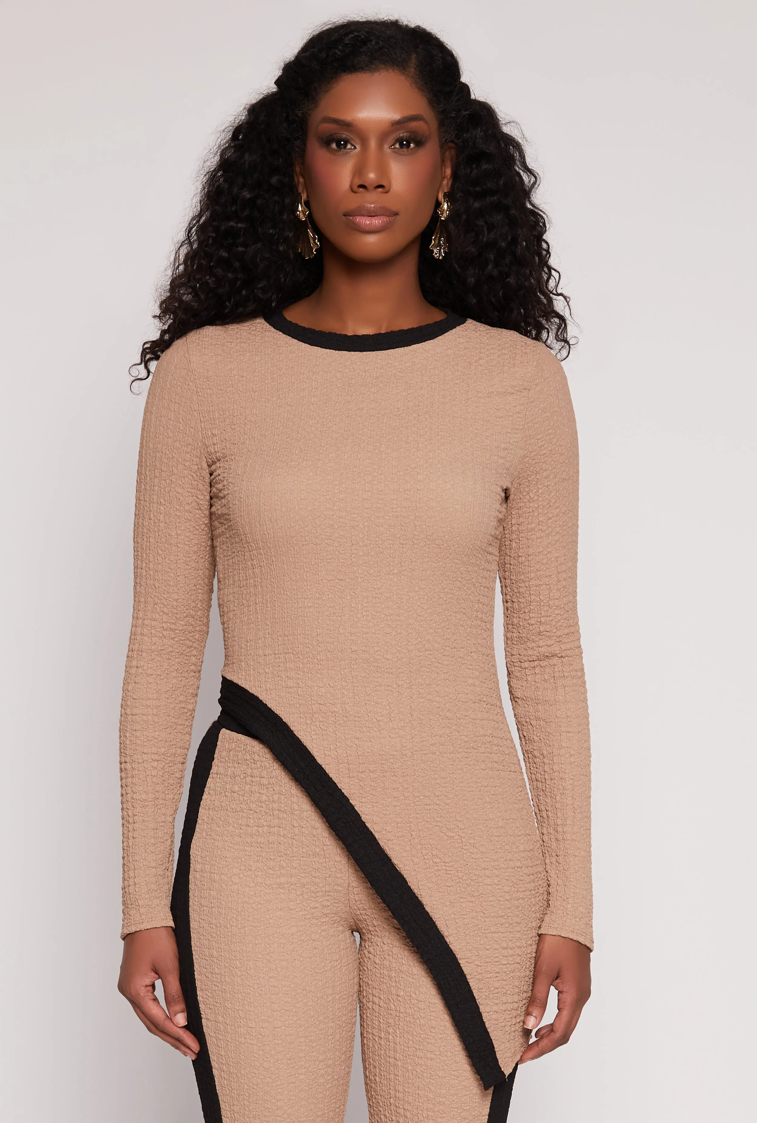 Textured Knit Asymmetrical Top sold by Rainbow