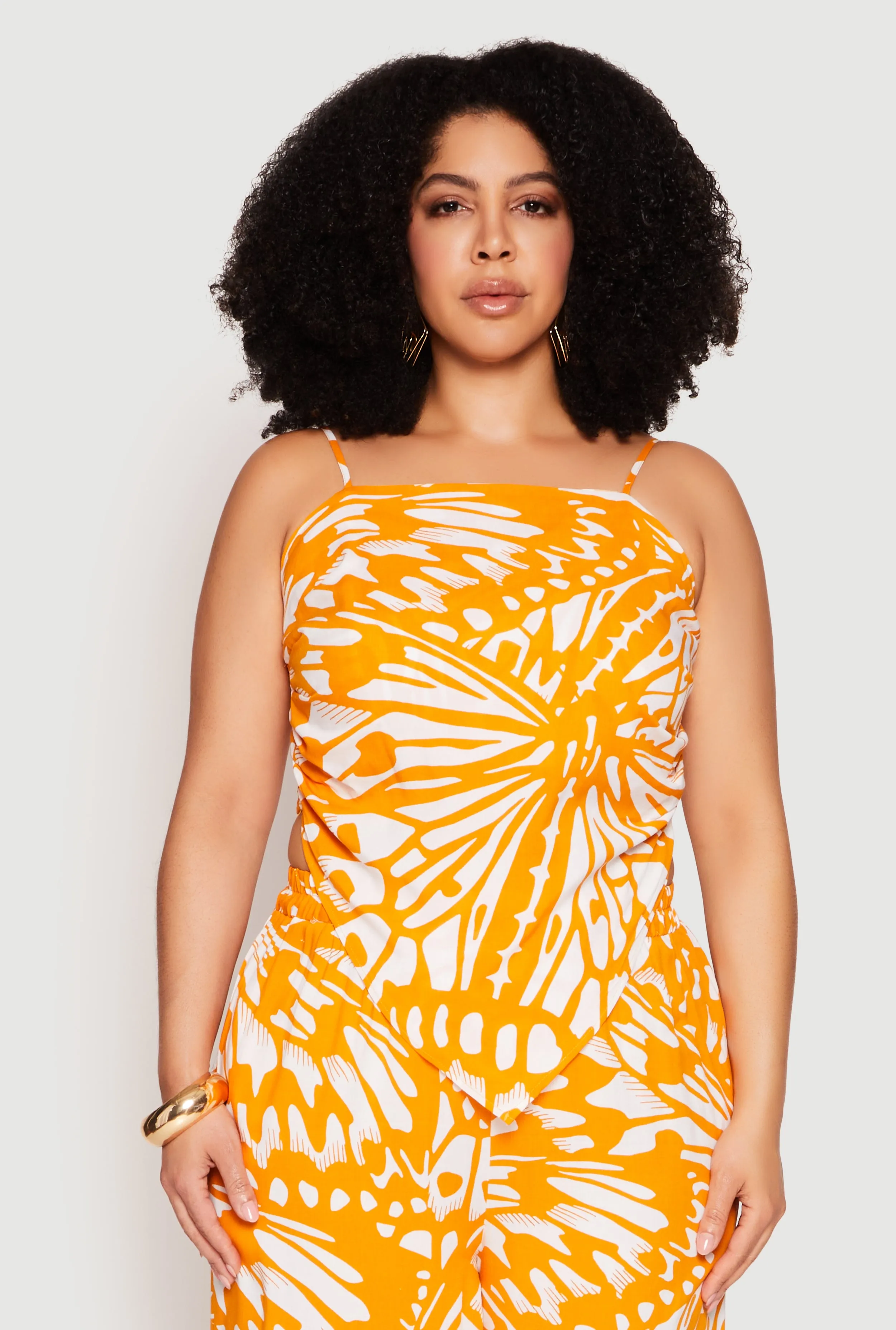 Plus Size Abstract Butterfly Print Hanky Hem Top sold by Rainbow