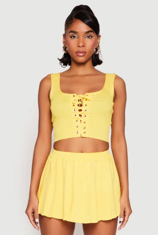 Textured Knit Pointelle Lace Up Crop Top sold by Rainbow