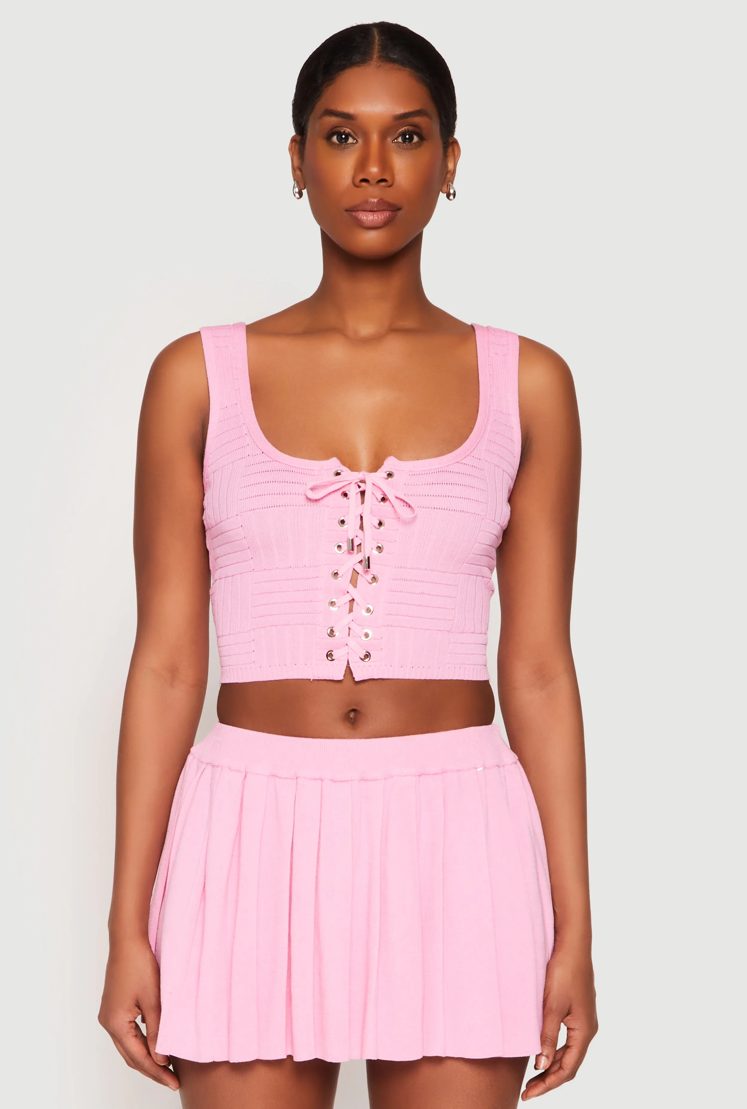 Textured Knit Pointelle Lace Up Crop Top sold by Rainbow