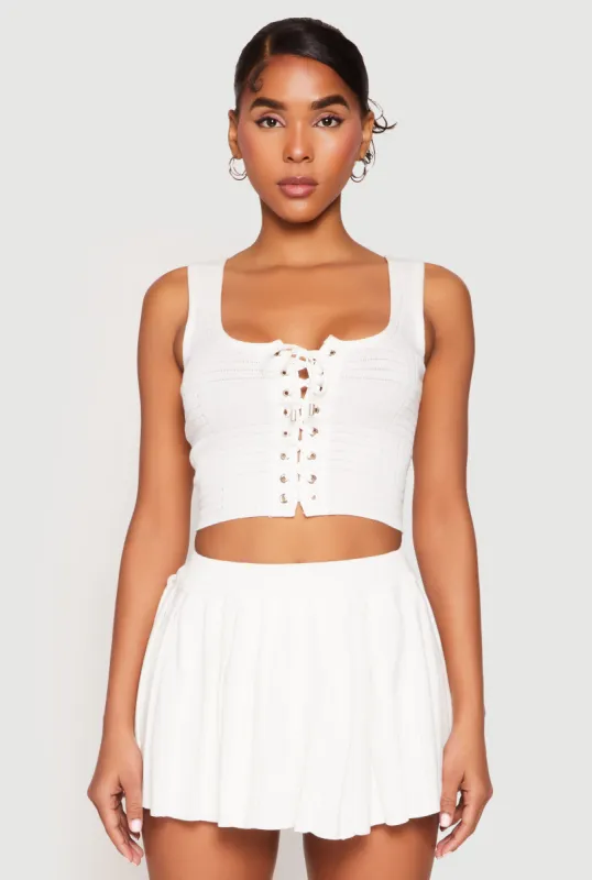 Textured Knit Pointelle Lace Up Crop Top sold by Rainbow