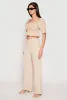 Airy Crepe Knit Wide Leg Dress Pants sold by Rainbow