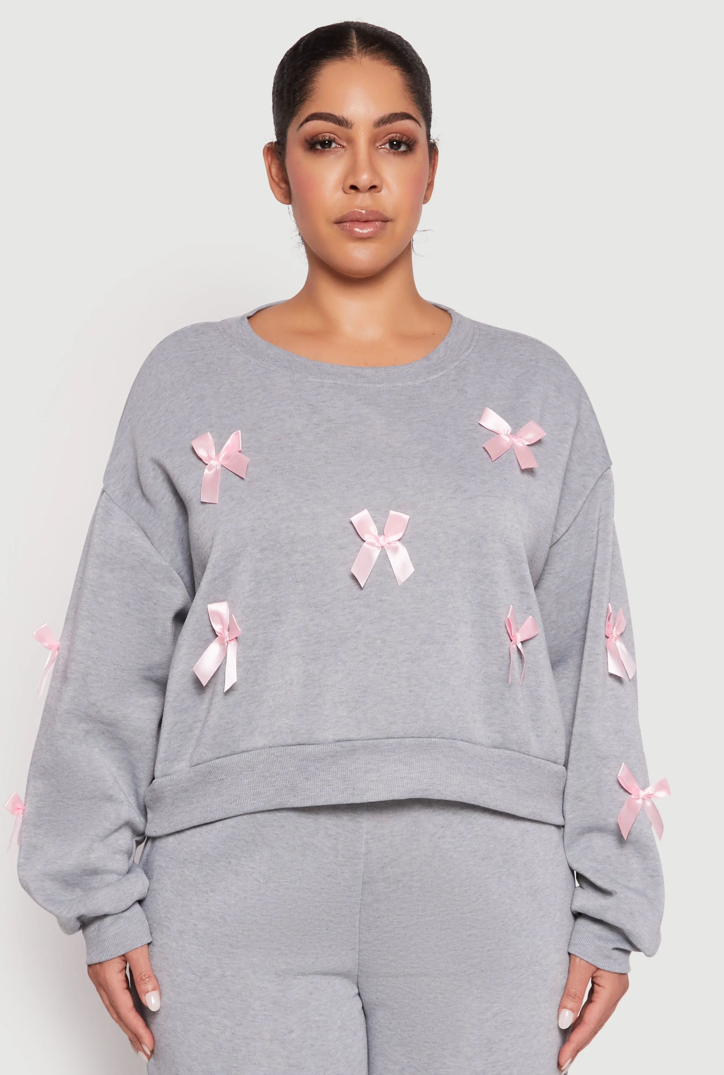 Plus Size Bow Detail Sweatshirt sold by Rainbow