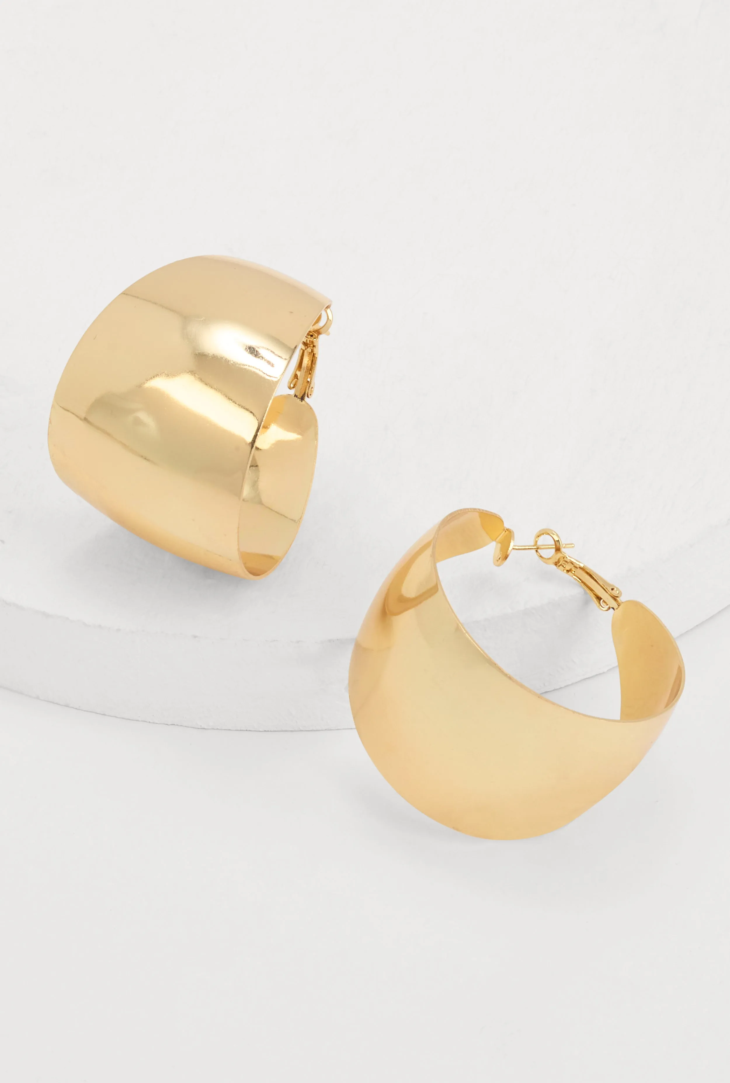 Metallic Wide Hoop Earrings sold by Rainbow