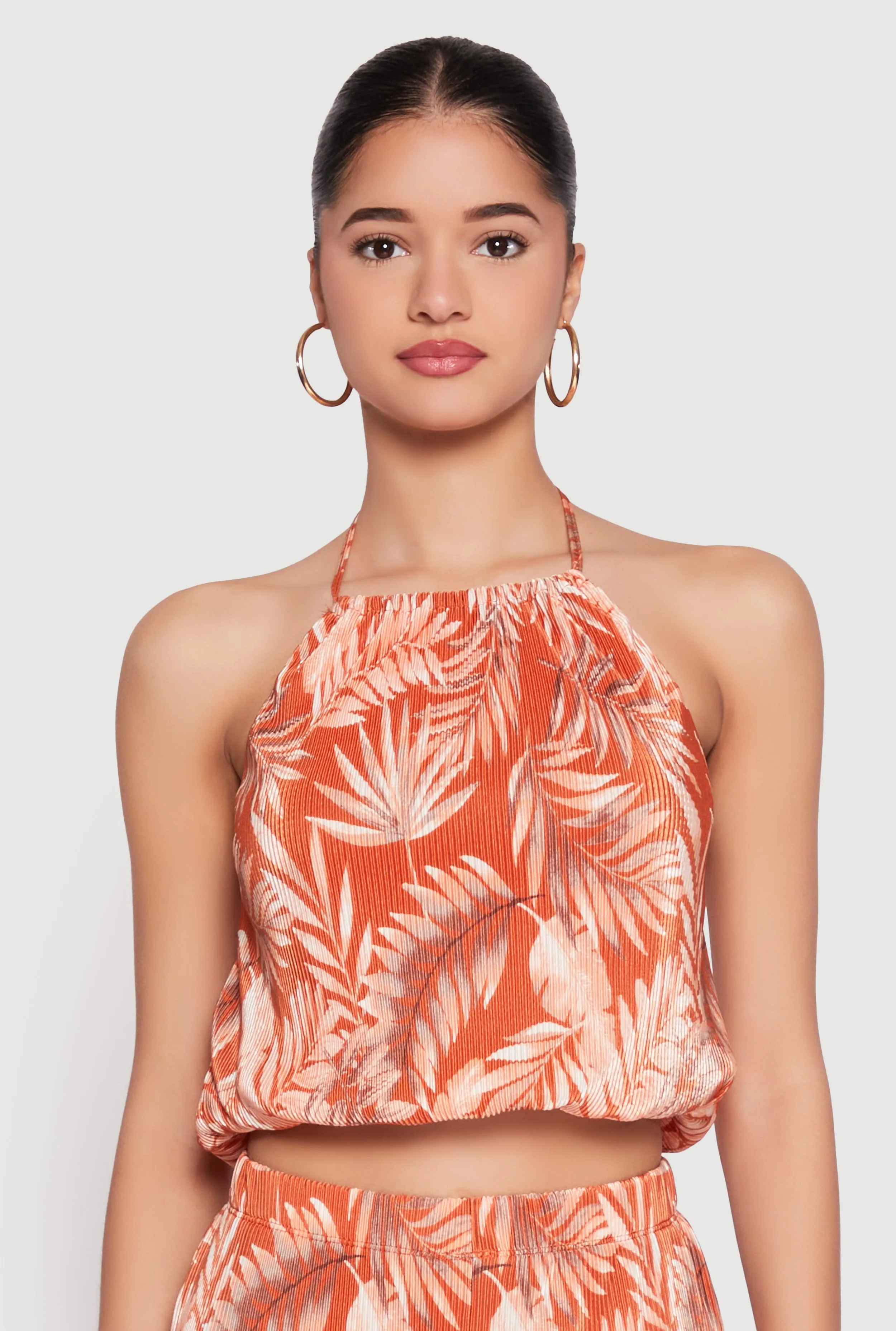 Almost Famous Plisse Tropical Print Cropped Halter Top sold by Rainbow