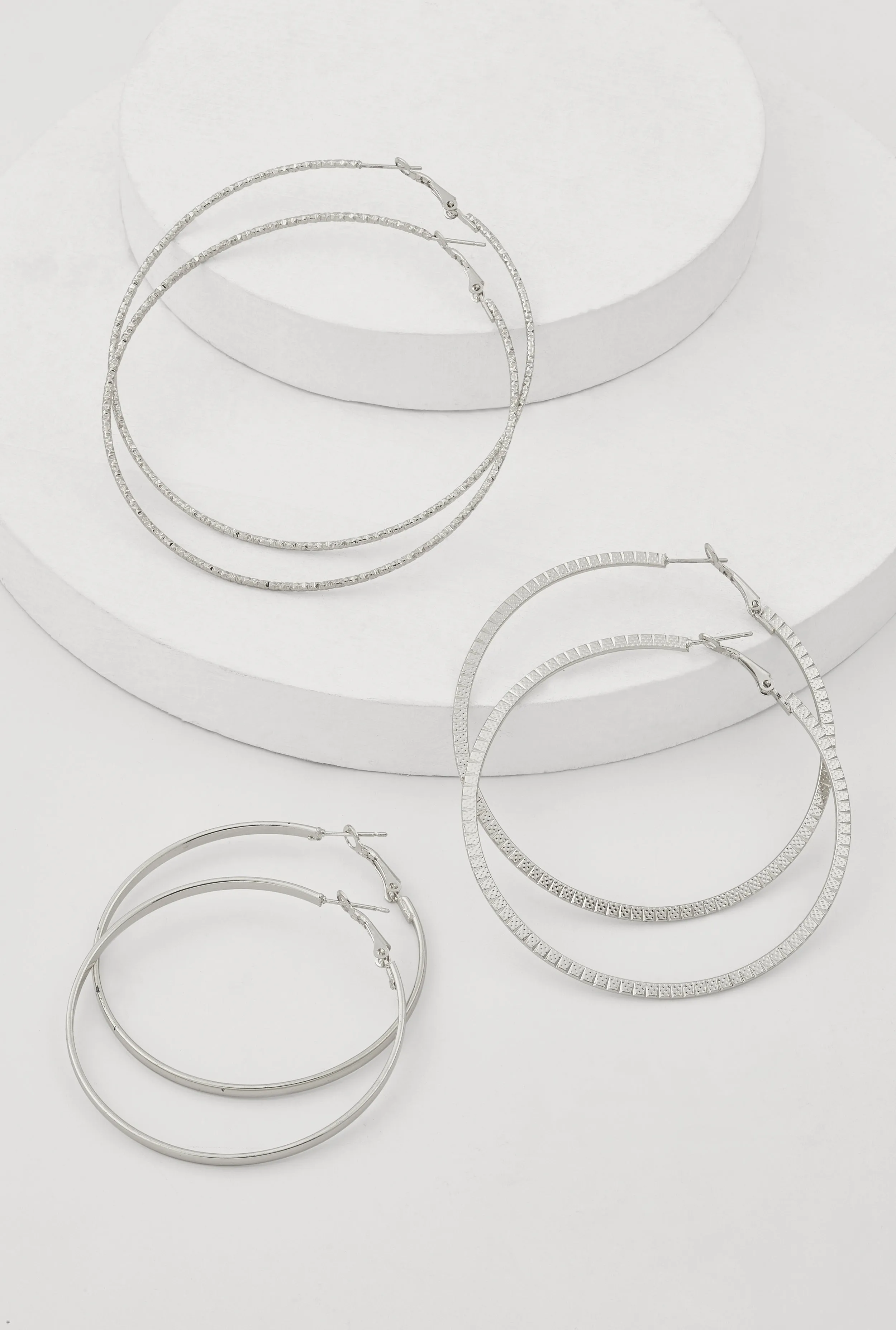 Metallic Textured Hoop Earrings Set of 3 sold by Rainbow