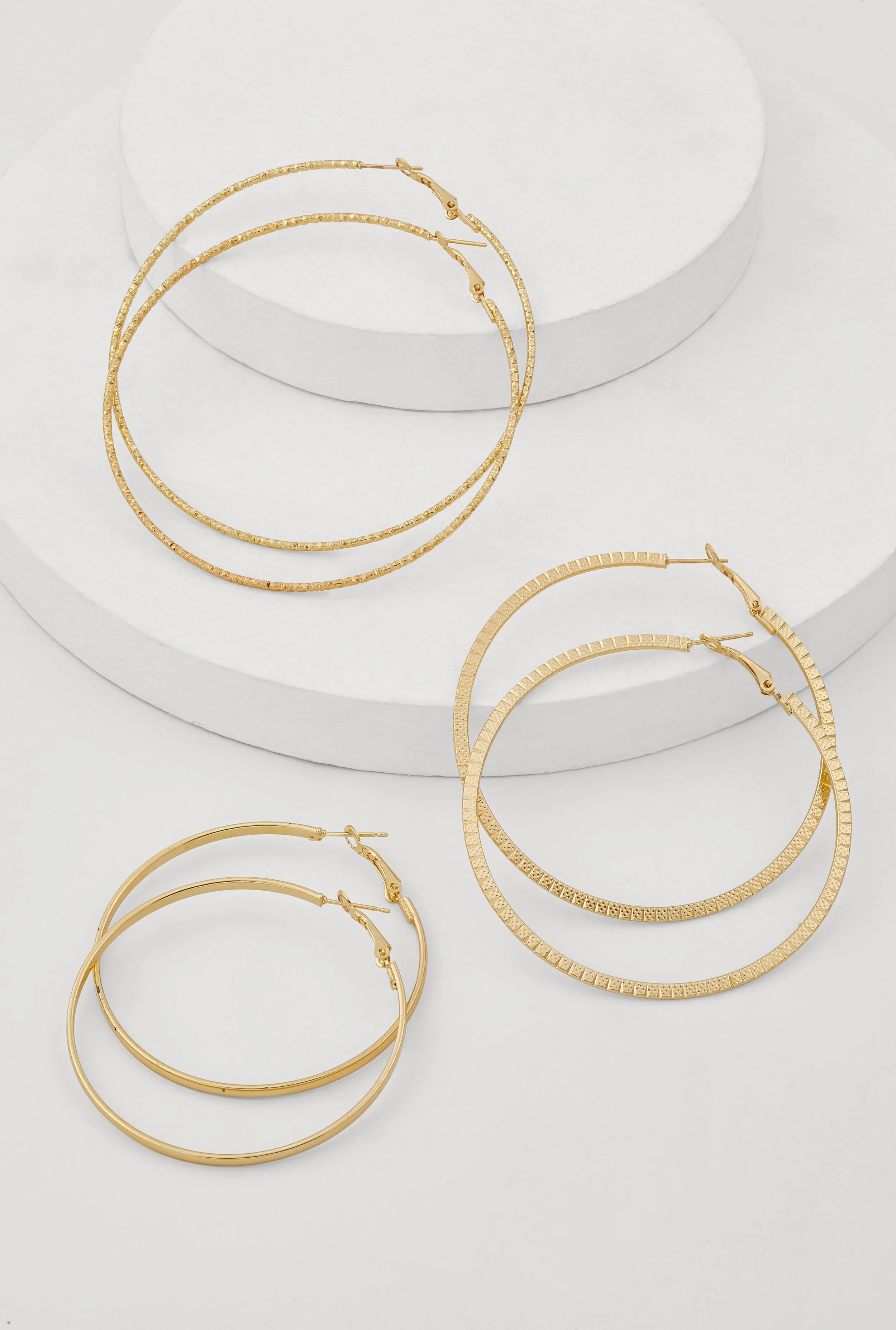 Metallic Textured Hoop Earrings Set of 3 sold by Rainbow