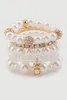 Assorted Faux Pearl Beaded Stretch Charm Bracelets Set of 5 sold by Rainbow