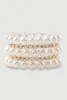 Faux Pearl and Rhinestone Stretch Bracelets Set of 5 sold by Rainbow