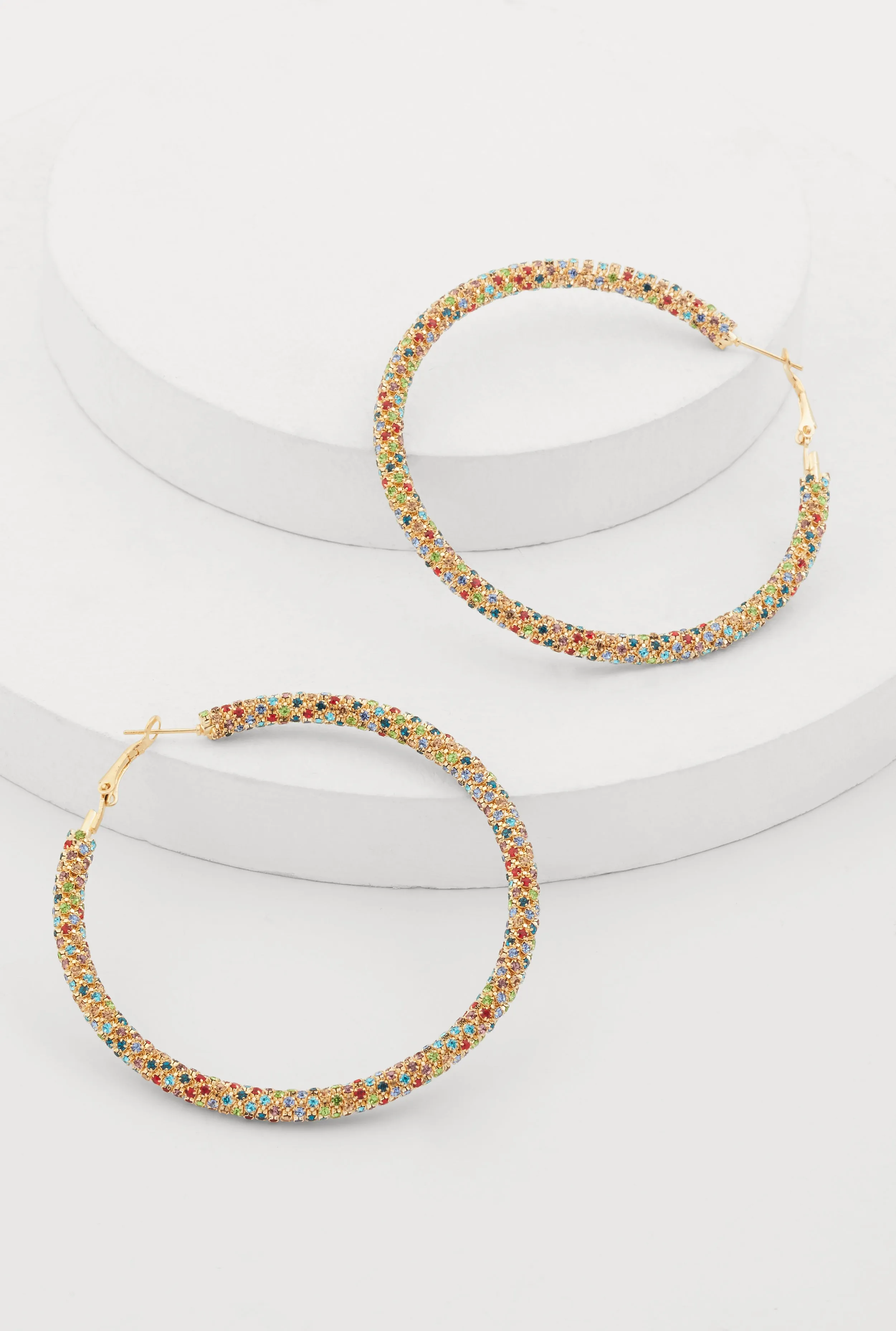 Rhinestone Encrusted Hoop Earrings sold by Rainbow