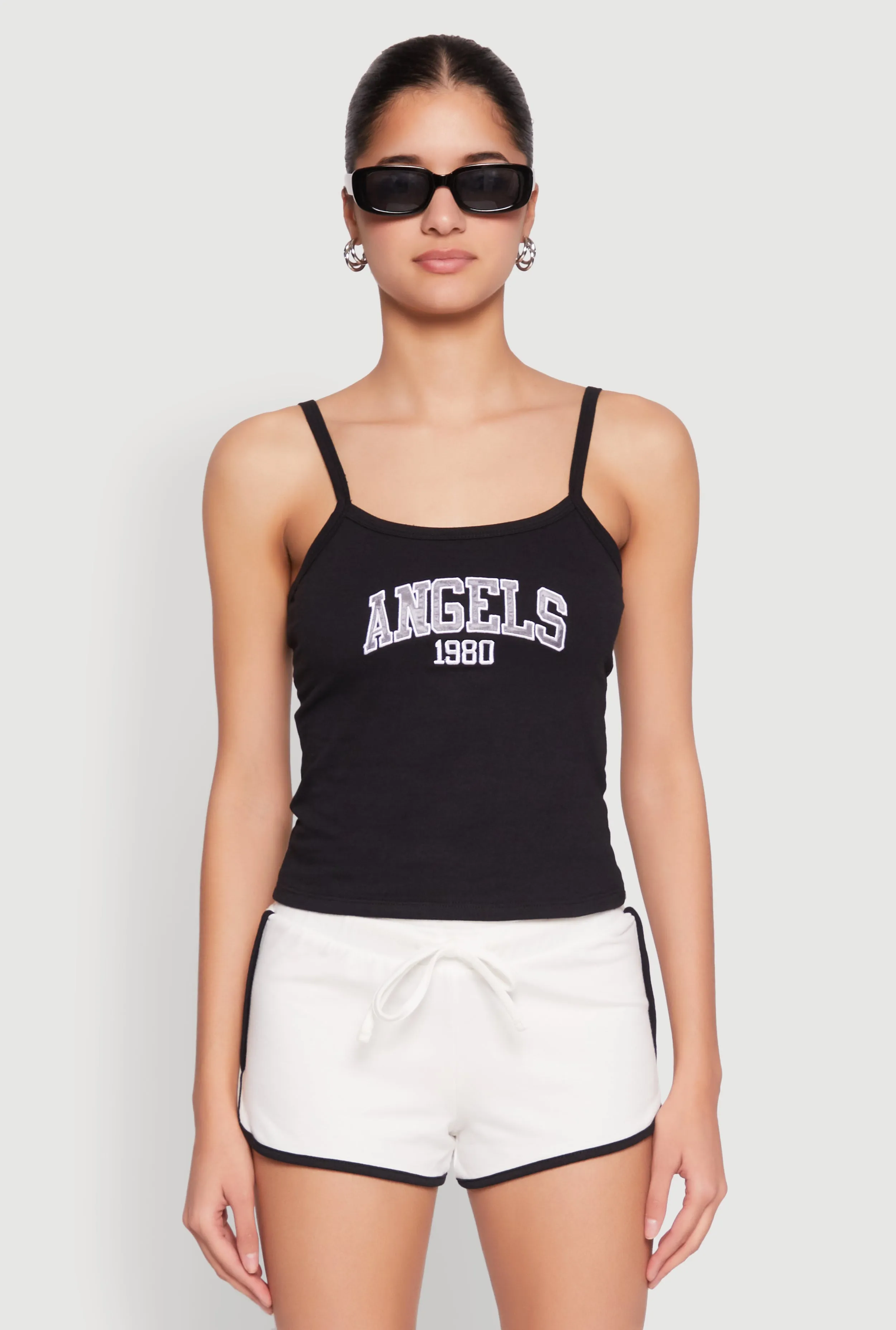 Almost Famous Graphic Print Cropped Cami sold by Rainbow