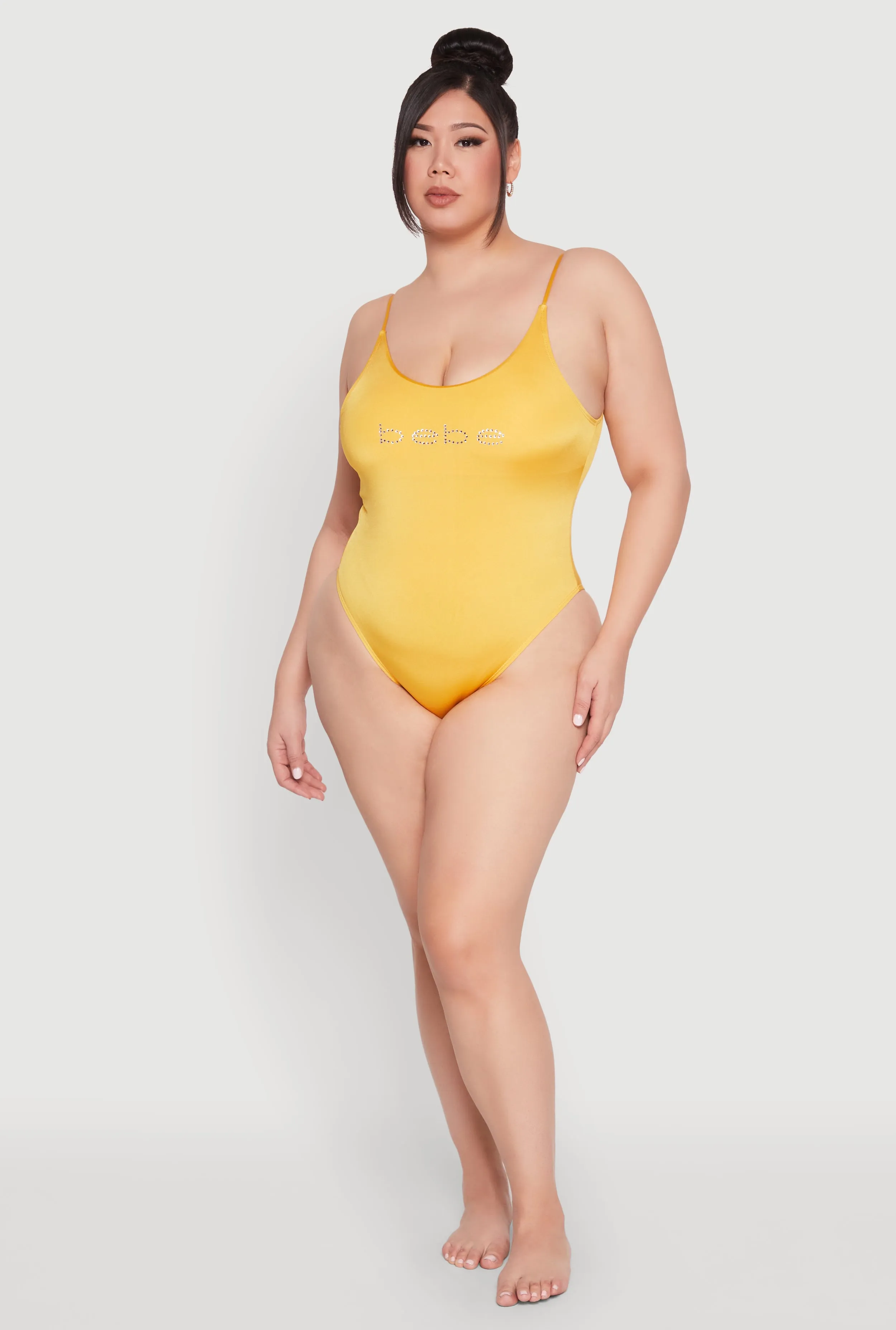 Plus Size Bebe Rhinestone One Piece Swimsuit sold by Rainbow