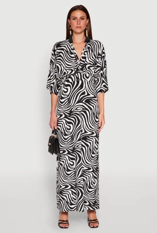Zebra Print Plunge Maxi Dress sold by Rainbow