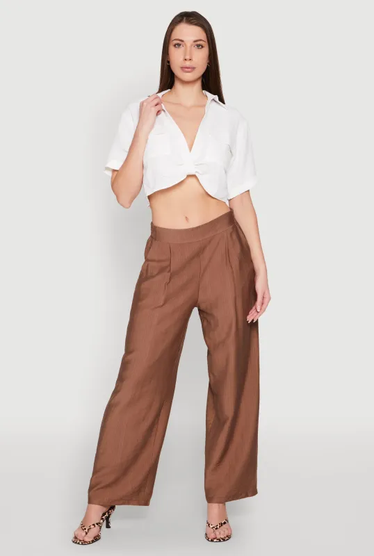 Crepe Knit Plunge Twist Front Shirt sold by Rainbow