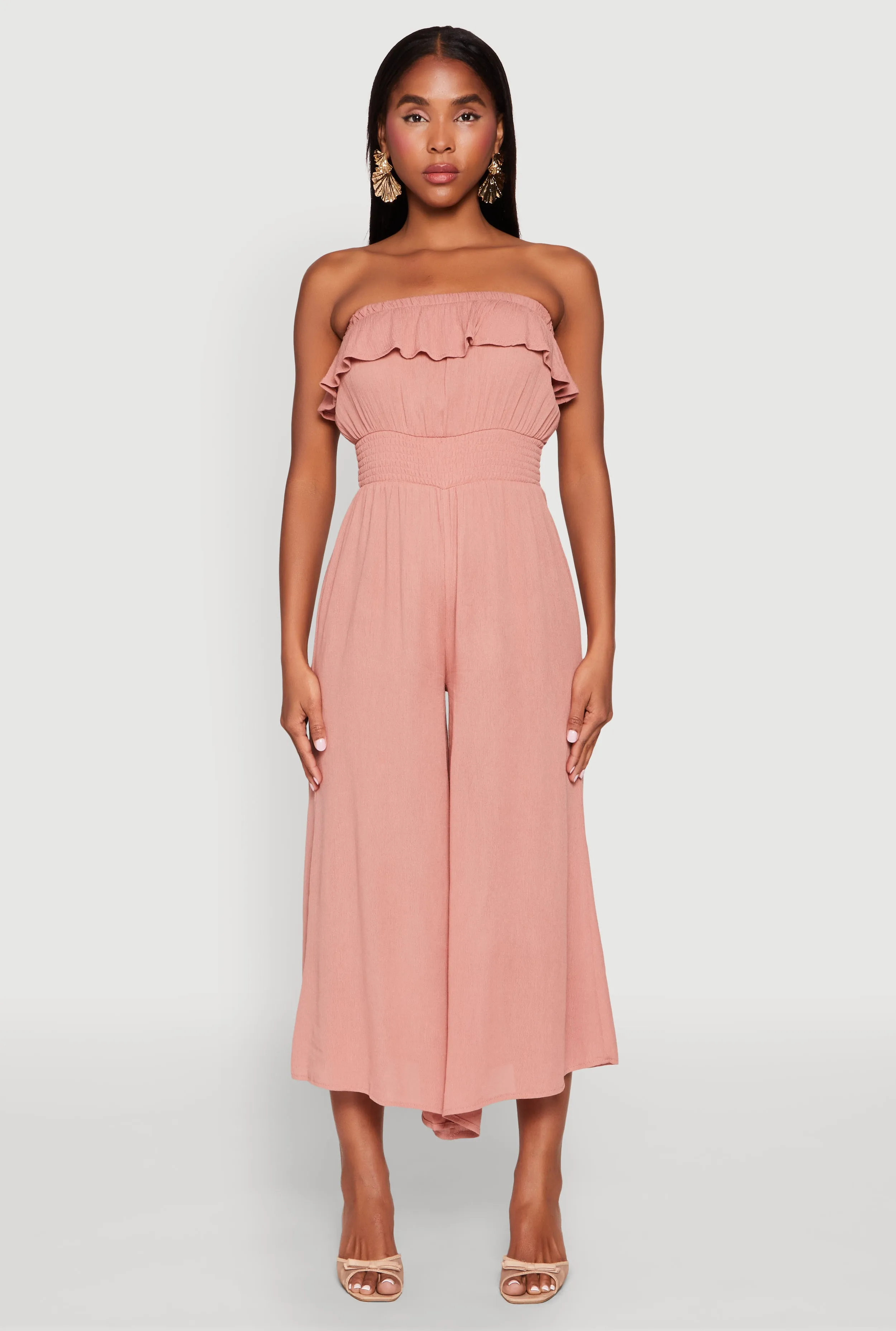 Almost Famous Ruffle Overlay Smocked Waist Jumpsuit sold by Rainbow