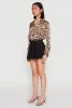 Solid Mini Pleated Skirt sold by Rainbow