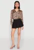 Solid Mini Pleated Skirt sold by Rainbow