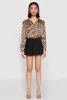 Solid Mini Pleated Skirt sold by Rainbow