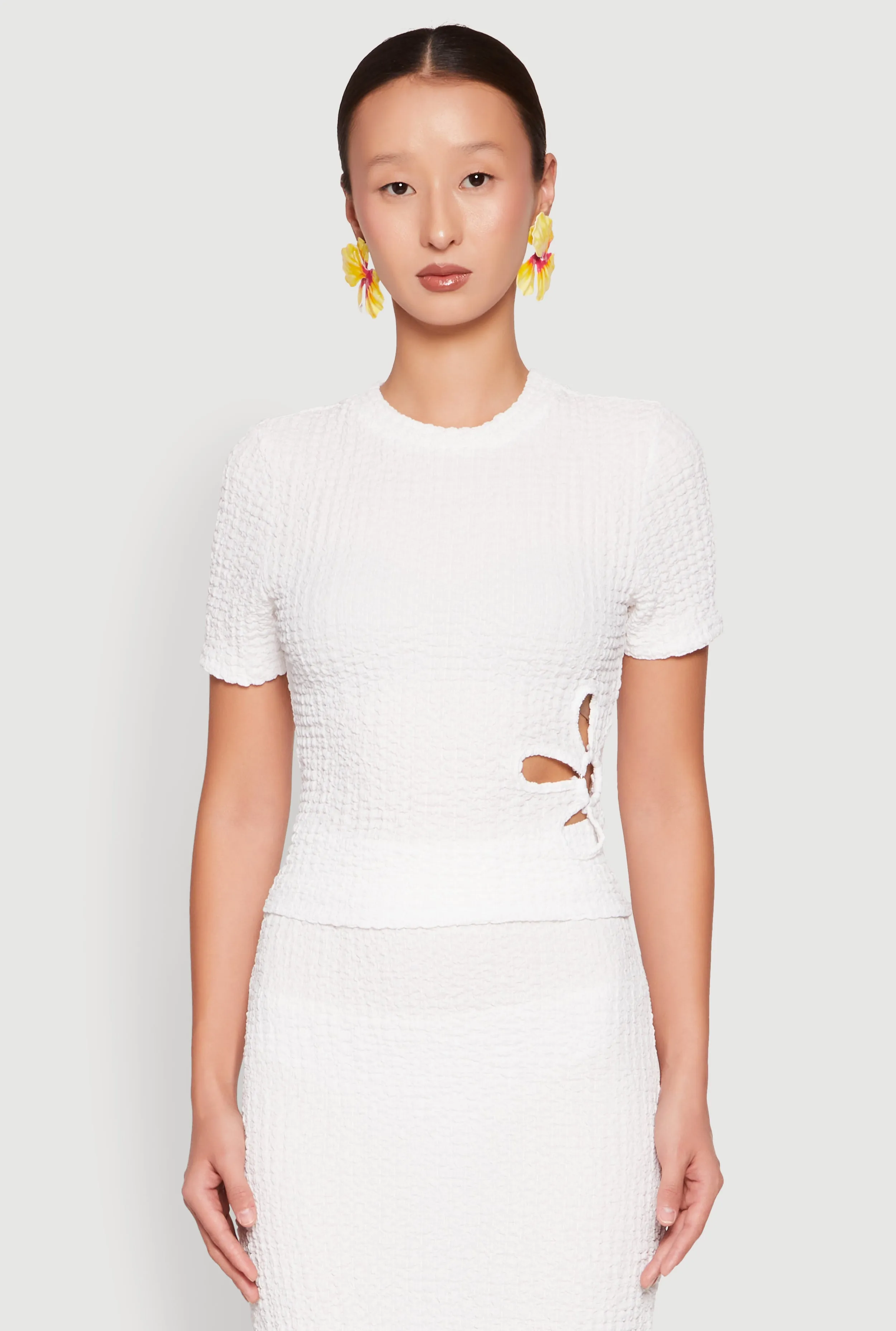 Flower Cut Out Textured Knit Top sold by Rainbow