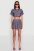 Linen Mini Pleated Skirt sold by Rainbow