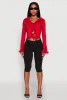 Ruffle Trim Tie Front Crop Top sold by Rainbow