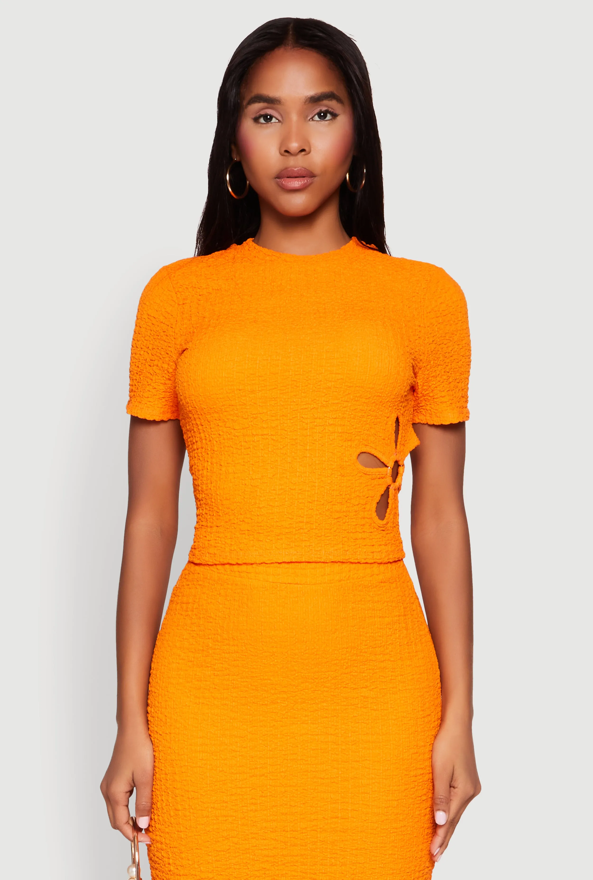 Flower Cut Out Textured Knit Top sold by Rainbow