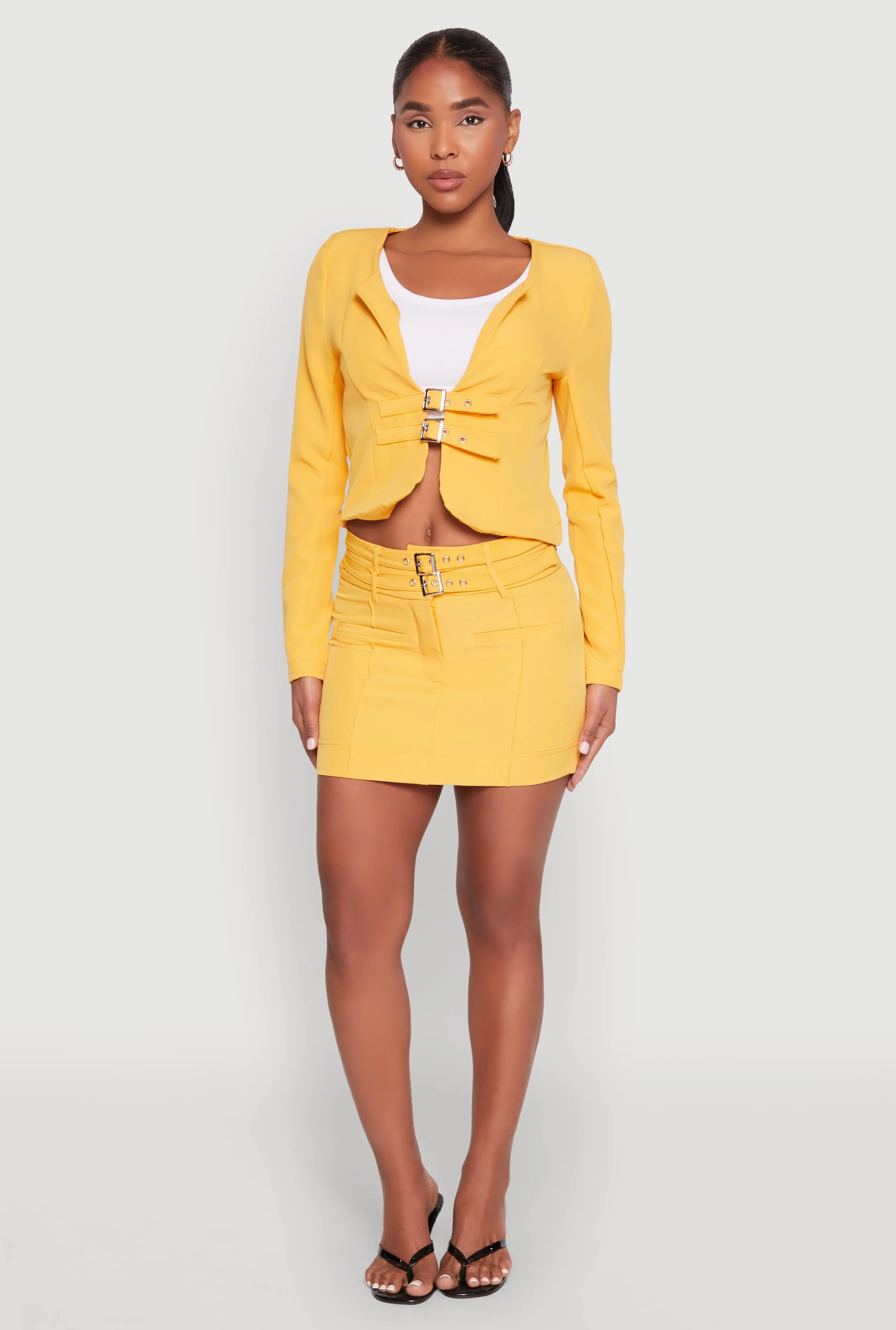 Double Buckle Front Mini Skirt sold by Rainbow