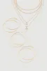 Cross Layered Necklace with Hoop Earring Trio sold by Rainbow