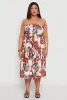 Plus Size Floral Print Smocked Tiered Midi Dress sold by Rainbow