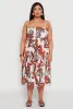 Plus Size Floral Print Smocked Tiered Midi Dress sold by Rainbow