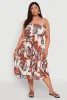 Plus Size Floral Print Smocked Tiered Midi Dress sold by Rainbow